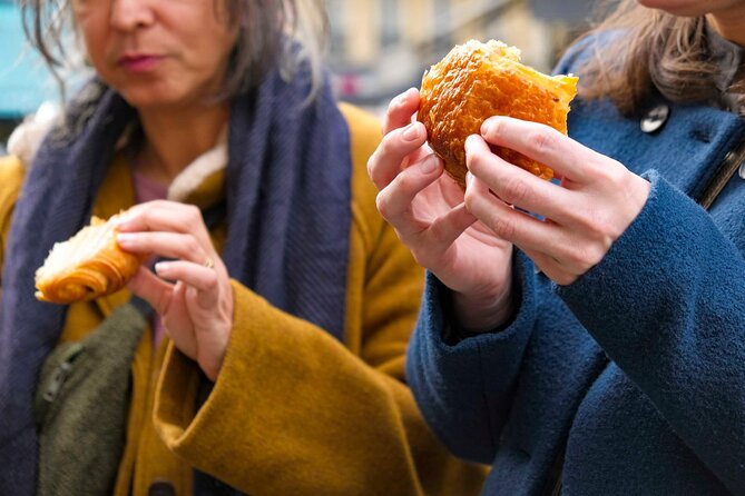 Paris Montmartre Food & Wine Tour with Eating Europe - Baguette and pain au chocolat at Boulangerie Alexine
