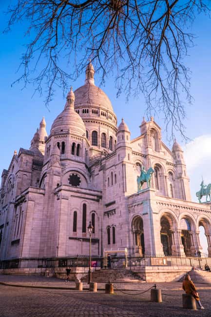 Paris: Montmartre Hidden Gems and Highlights Walking Tour - Walking through Rue des Abbesses