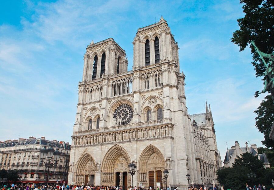 Paris: Notre Dame Exterior Walking Tour with Sainte Chapelle - Place Dauphine, a calm royal square
