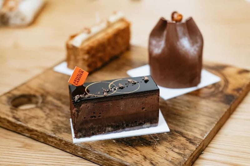 Paris: Saint Germain des Prés Guided Foodie Walking Tour - Savory food and the former palace chef