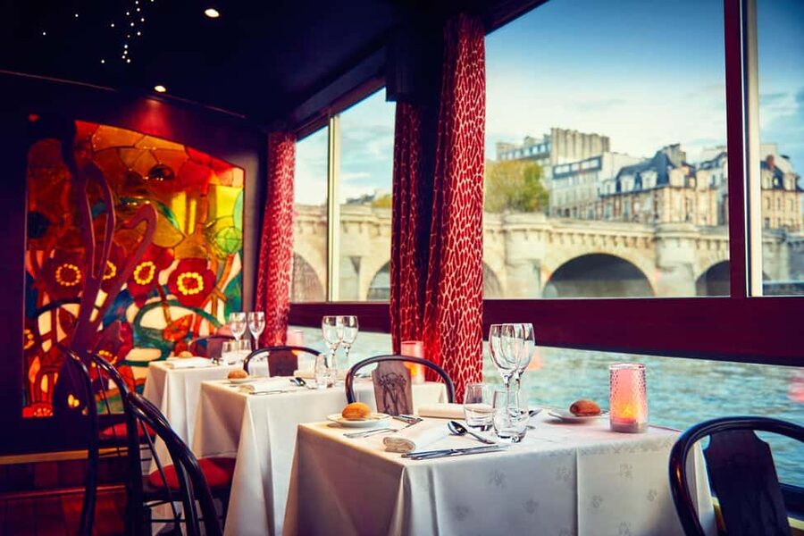 Paris: Seine River Cruise with 3-Course Dinner & Live Music - A small dinner boat with a front-row view