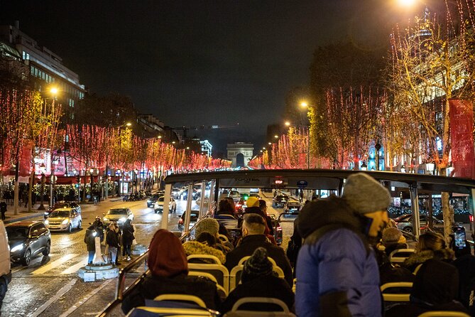 Paris Tootbus Festive Christmas Lights Tour - The Arc de Triomphe from a high seat