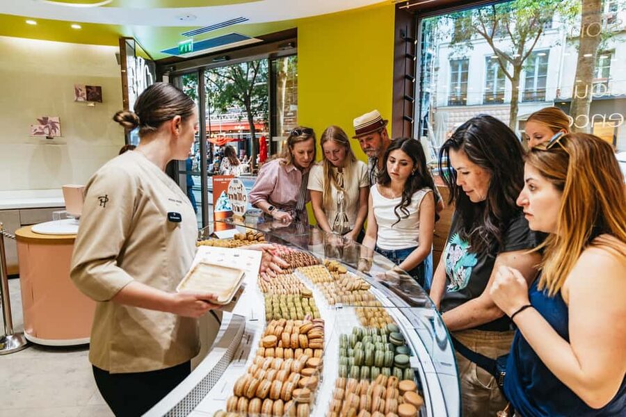 Paris: Walking Food Tour with Cheese, Wine and Delicacies - Cheese, baguette, and wine in a practical Paris setting