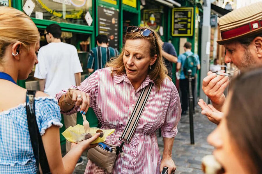 Paris: Walking Food Tour with Cheese, Wine and Delicacies - The restaurant stop adds a proper savory break
