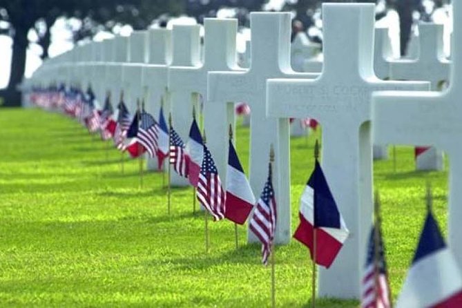 Private D-Day Experience from Bayeux - Omaha Beach, where the day begins with scale and loss
