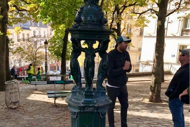See 15+ Top Sights Paris Tour with Fun Guide, (Walking and Metro Tour) - Arc de Triomphe and the grand Paris view