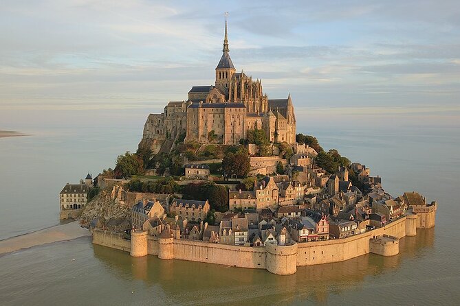 Transfers between Paris and Paris Airports/Disneyland/Versailles - Versailles and Giverny beyond central Paris