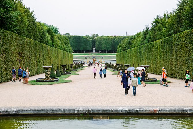 Versailles Château and Gardens Walking Tour from Paris by Train - Entering the palace with a timed ticket