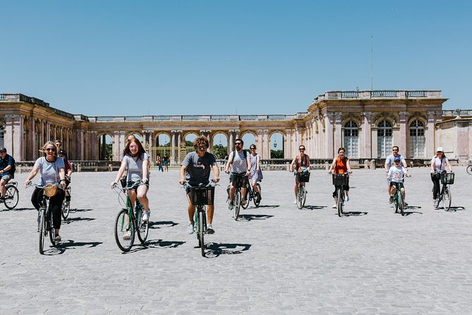 Versailles Domain Bike Tour with Palace Entry by Train from Paris - Riding through the royal gardens