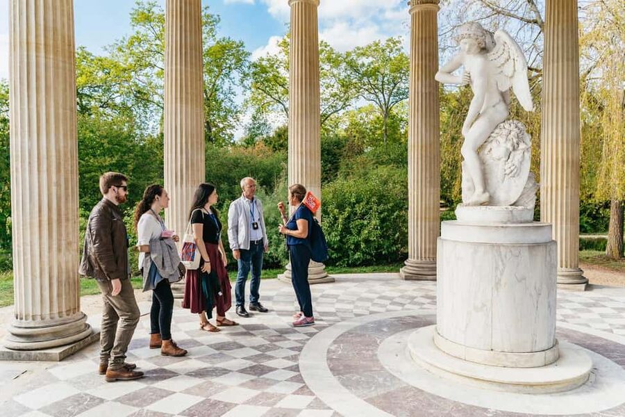 Versailles: Palace, Gardens & Marie Antoinette’s Estate Tour - Meeting near the station, then walking to the palace