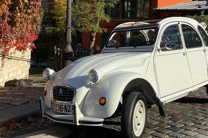 Vintage 2CV Adventure: 1-Hour Paris Highlights Tour - Comfort, weather, and the open roof